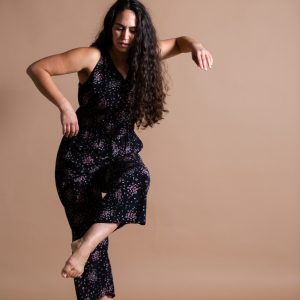 A movement shot of professional dance artist, Caitlyn Schrader.
