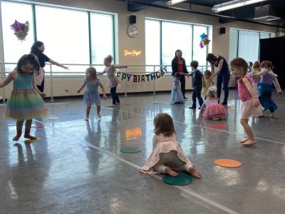 A dance studio full of dancers age 2-5 dance playfully during the Birthday Bash.